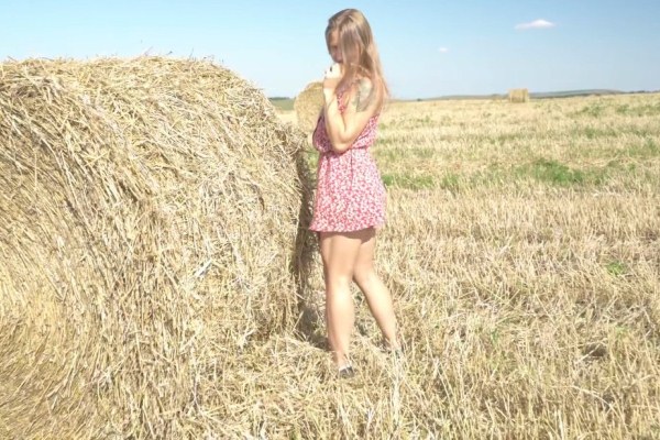 Russian sex in the straw on the field