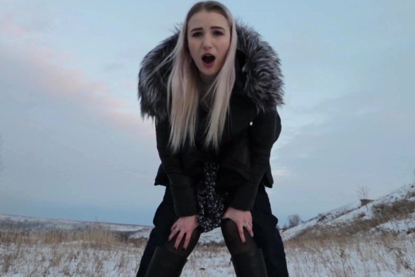 Amateur sex with blonde in pantyhose in winter in the middle of the field